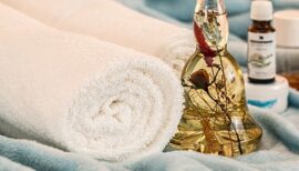 huile de massage et serviette